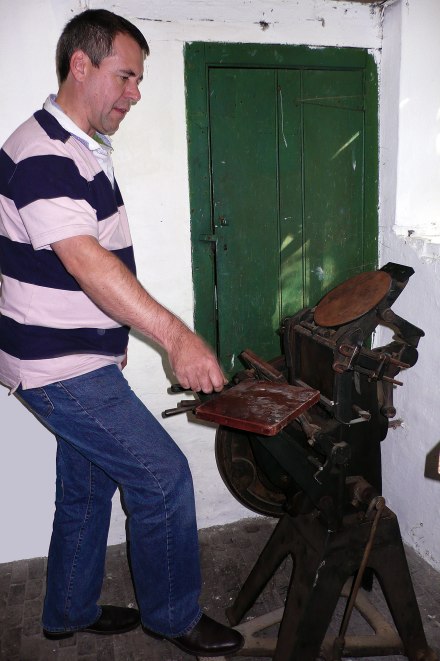 Bill Davis gifting his mother's printing press to the Merz Barn project